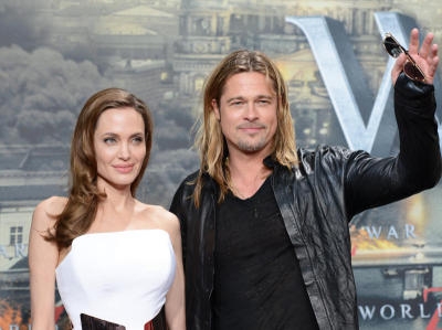 Das US-Schauspielerpaar Brad Pitt und Angelina Jolie trifft am 04.06.2013 in Berlin zur Premiere des Films World War Z im Kino Cinestar am Potsdamer Platz ein. Der Streifen läuft ab 27. Juni 2013 in den deutschen Kinos. Foto: Jens Kalaene/dpa +++(c) dpa - Bildfunk+++