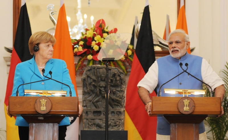 <p>epa04964245 German Chancellor Angela Merkel (L) and Indian Prime Minister Narendra Modi (R) speak during a joint news conference after the third Indian-German intergovernmental consultations in New Dehli, India, 05 October 2015; Seen in center is a statue of the Hindu goddess Durga which was handed back to India by the Linden Museum of Stuttgart, Germany, on occasion of Merkel's visit to India. EPA/STRNGER +++(c) dpa - Bildfunk+++</p>