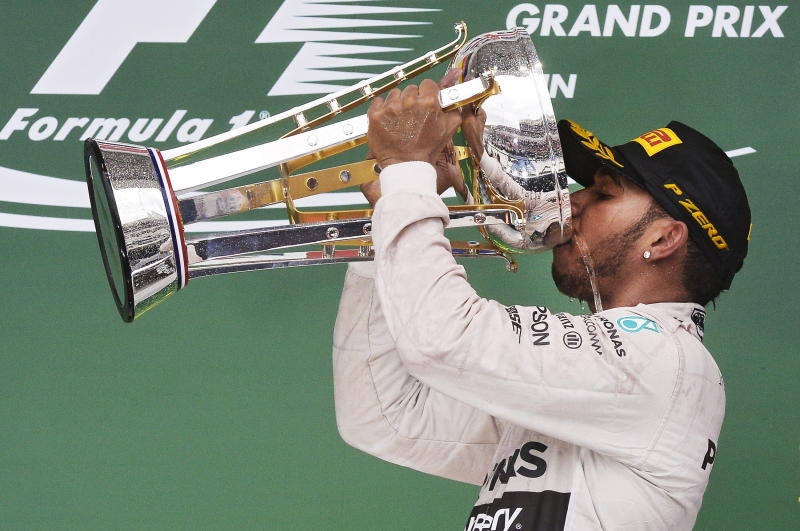 ARCHIV - (L-R) German Sebastian Vettel of Ferrari, German Nico Rosberg of Mercedes and British Lewis Hamilton, participate in a press conference after the qualifying session of the 2015 Formula One Grand Prix of Mexico at the Autodromo Hermanos Rodriguez in Mexico City, Mexico, 31 October 2015. The 2015 Formula One Grand Prix of Mexico takes place on 01 November. EPA/RONALDO SCHEMIDT/POOL (zu dpa «Vettel und Rosberg im Kampf um Vize-WM - Hamilton will Senna-Hommage» vom 11.11.2015) +++(c) dpa - Bildfunk+++