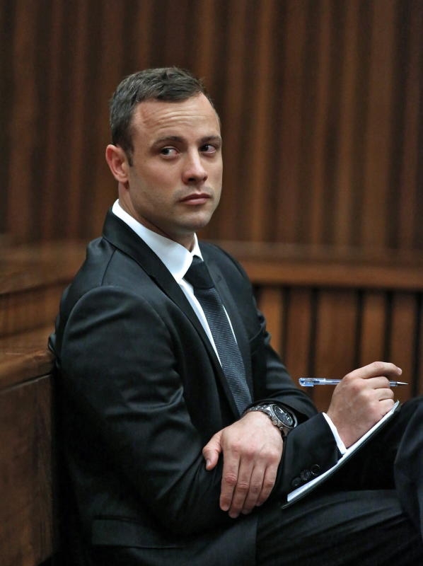 Olympic and Paralympic track star Oscar Pistorius looks on ahead of his trial for the murder of his girlfriend Reeva Steenkamp, at the North Gauteng High Court in Pretoria, South Africa, 05 March 2014. Pistorius is standing trial for the premeditated murder of his model girlfriend Reeva Steenkamp in February 2013. EPA/Siphiwe Sibeko/POOL