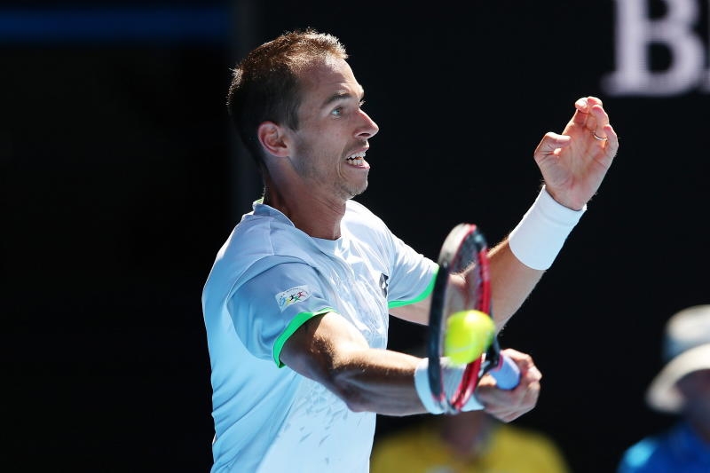 epa05119894 Lukas Rosol of the Czech Republic returns the ball to Stanislas Wawrinka of Switzerland during their third round match at the Australian Open Grand Slam tennis tournament in Melbourne, Australia, 23 January 2016. EPA/DAVID CROSLING AUSTRALIA AND NEW ZEALAND OUT +++(c) dpa - Bildfunk+++