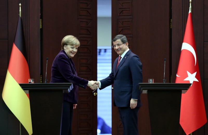 A handout picture provided by Turkish Prime Minister Press office of Turkish Prime Minister Ahmet Davutoglu (R) chats with German Chancellor Angela Merkel (L) during their meeting in Ankara, Turkey, 08 February 2016. German Chancellor Angela Merkel is on an official visit to Turkey.