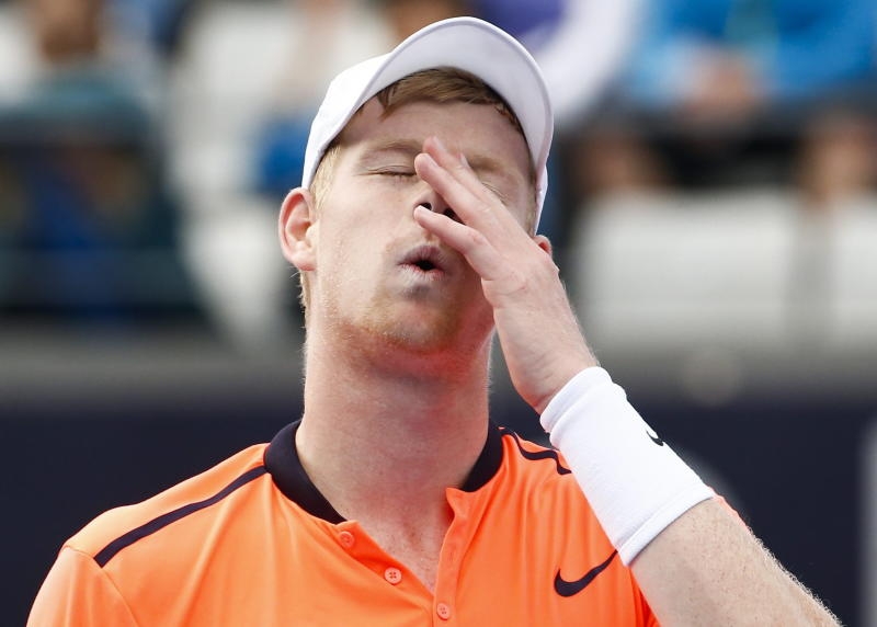 <p>Kyle Edmund of Britain reacts during a men's second round match against Roberto Bautista Agut of Spain in the China Open tennis tournament at the National Tennis Center in Beijing</p>