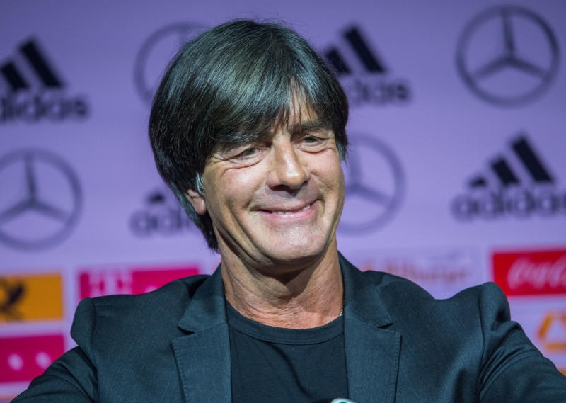 <p>15.05.2018, Nordrhein-Westfalen, Dortmund: Fußball: WM, Nationalmannschaft, Bekanntgabe des vorläufigen WM-Kaders der deutschen Fußball-Nationalmannschaft für die WM in Russland im Fußballmuseum: Bundestrainer Joachim Löw sitzt bei einer Pressekonferenz auf der Bühne. Foto: Federico Gambarini/dpa +++ dpa-Bildfunk +++</p>
