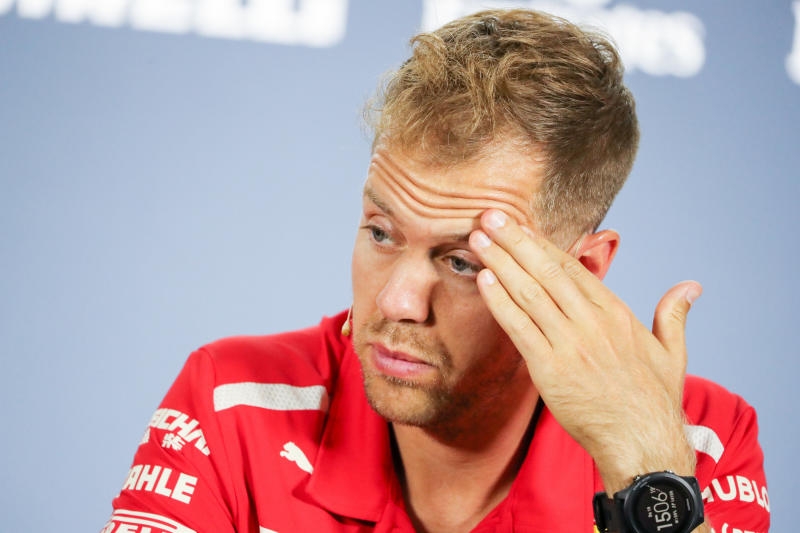 <p>19.07.2018, Baden-Württemberg, Hockenheim: Motorsport: Formel-1-Weltmeisterschaft, Grand Prix von Deutschland. Sebastian Vettel aus Deutschland vom Team Scuderia Ferrari sitzt in einer Pressekonferenz. Foto: Jan Woitas/dpa-Zentralbild/dpa +++ dpa-Bildfunk +++</p>
