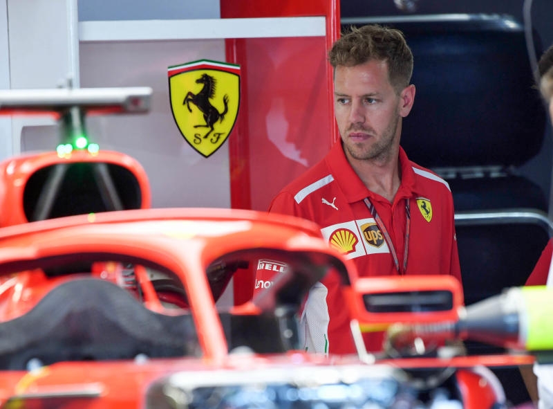 <p>19.07.2018, Baden-Württemberg, Hockenheim: Motorsport: Formel-1-Weltmeisterschaft, Grand Prix von Deutschland. Sebastian Vettel aus Deutschland vom Team Scuderia Ferrari sitzt in einer Pressekonferenz. Foto: Jan Woitas/dpa-Zentralbild/dpa +++ dpa-Bildfunk +++</p>