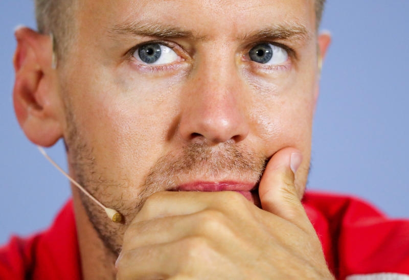 <p>19.07.2018, Baden-Württemberg, Hockenheim: Motorsport: Formel-1-Weltmeisterschaft, Grand Prix von Deutschland. Sebastian Vettel aus Deutschland vom Team Scuderia Ferrari sitzt in einer Pressekonferenz. Foto: Jan Woitas/dpa-Zentralbild/dpa +++ dpa-Bildfunk +++</p>